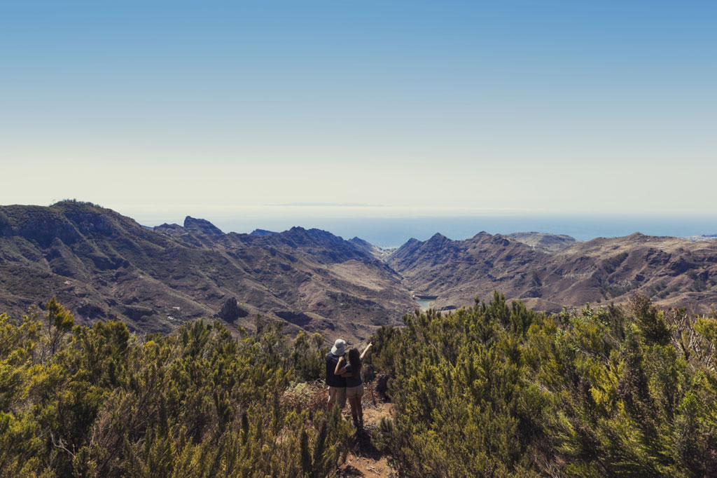 Panoramic view of the Anaga Rural Park in Tenerife with mountains and ocean in the background.