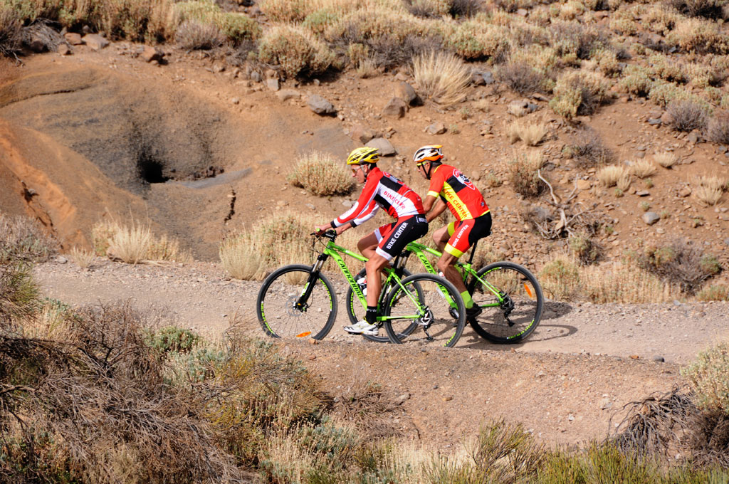 Cyclists on a dirt road in Tenerife.