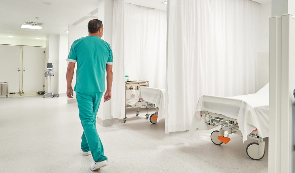 Medical staff walking down a hospital corridor in Tenerife.