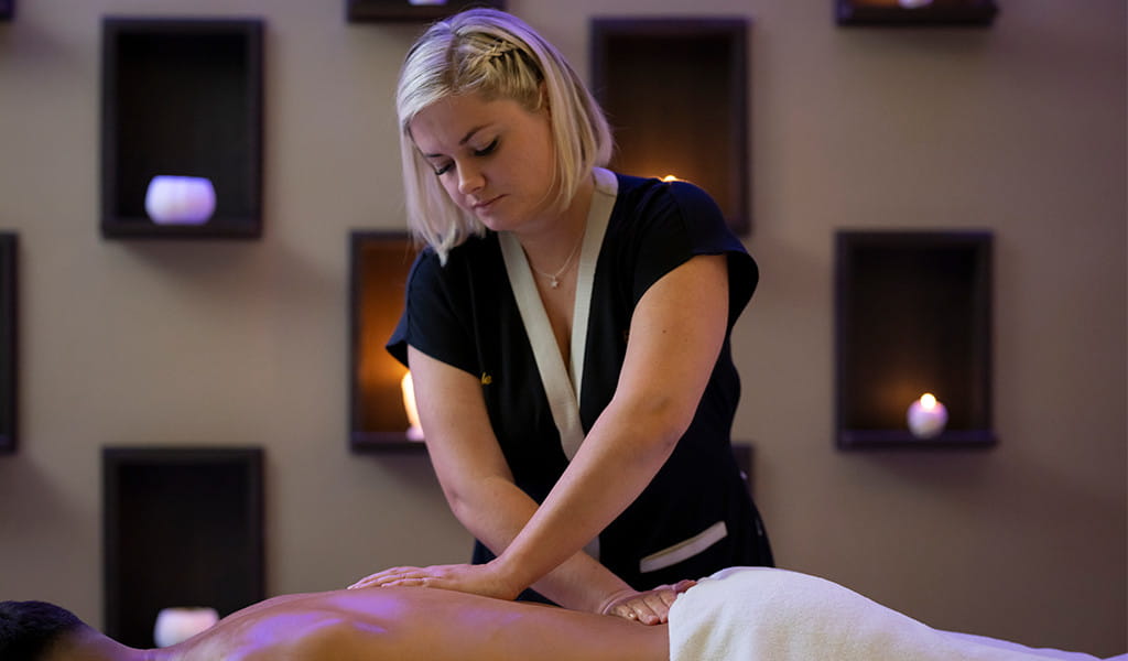 Therapist giving a relaxing massage in Tenerife.
