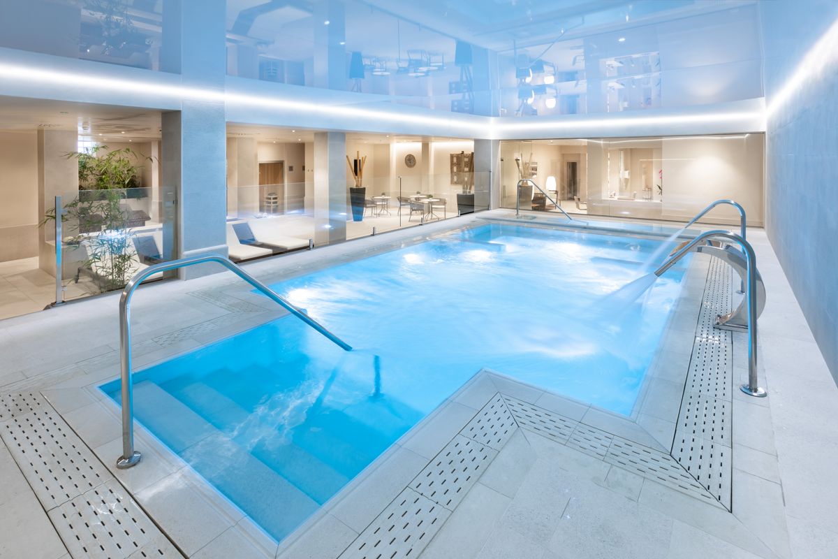 Modern and bright indoor swimming pool in a hotel in Tenerife.
