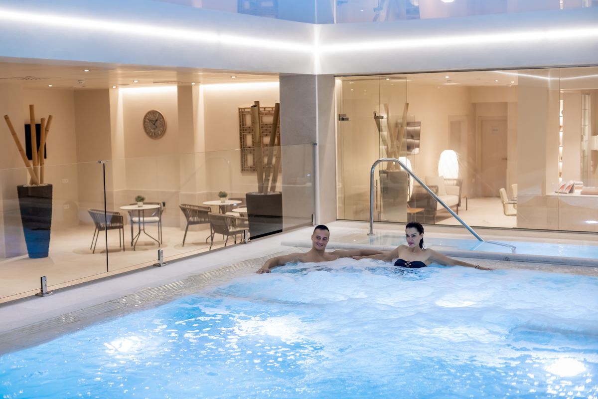 People relaxing in a jacuzzi at a spa in Tenerife.