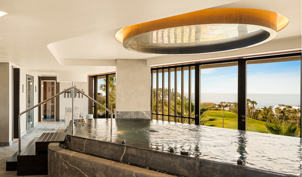 Indoor spa with jacuzzi and panoramic view of Las Terrazas de Abama in Tenerife.