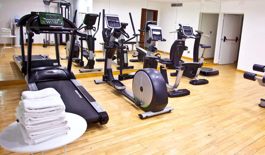 Gym with treadmills and stationary bikes in a hotel in Tenerife.