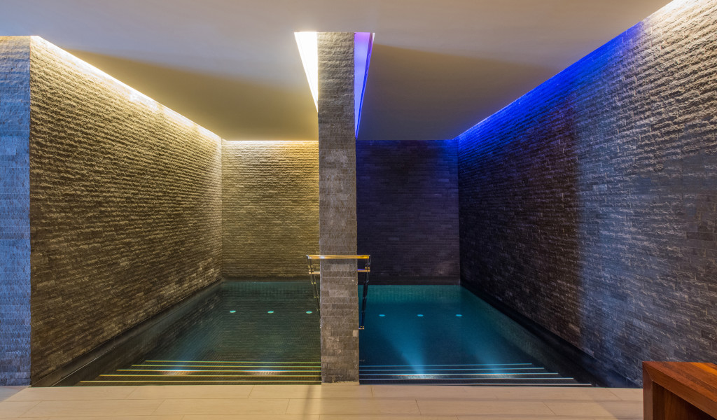Indoor illuminated swimming pool in a hotel in Tenerife.