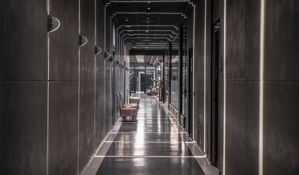 Modern hallway with dim lighting in a building in Tenerife.
