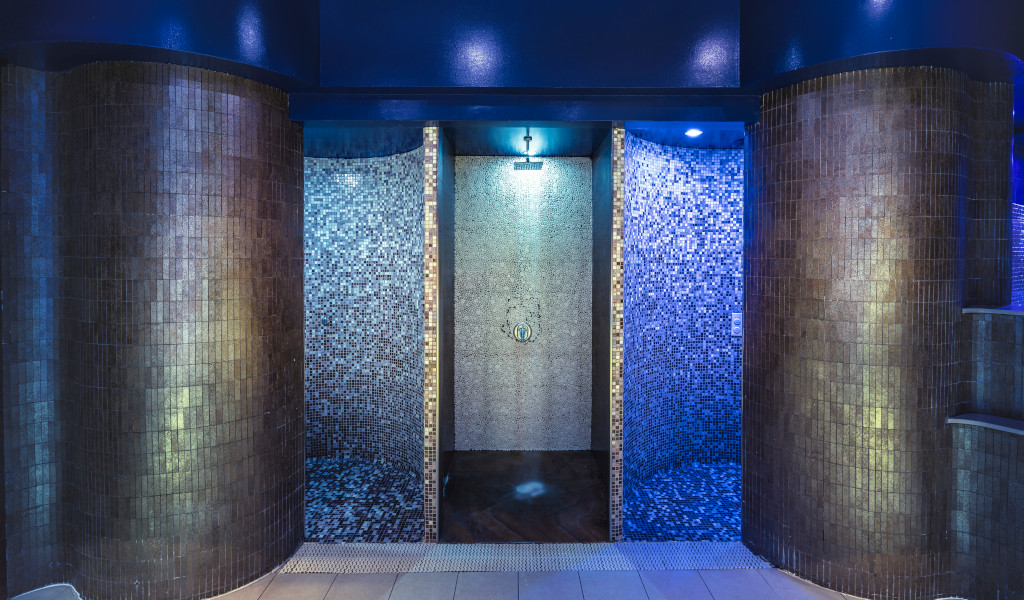 Blue mosaic shower in a spa in Tenerife.