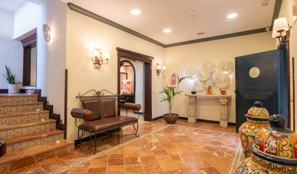 Staircase and decorated lobby inside an establishment in La Laguna, Tenerife.
