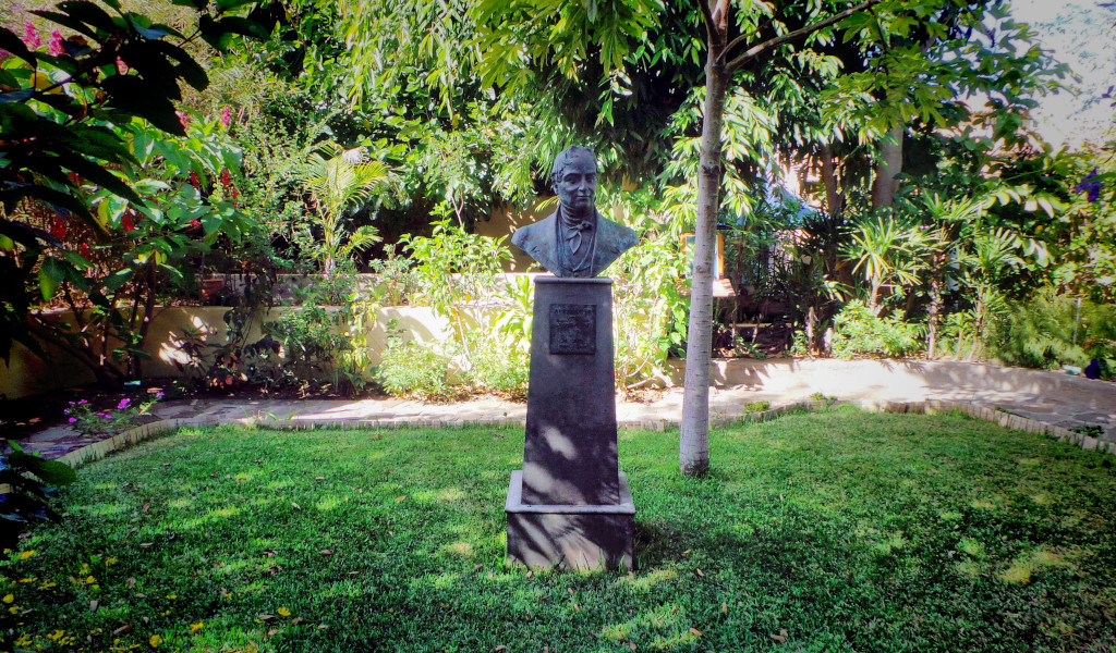 Bust in a garden surrounded by greenery in Tenerife.