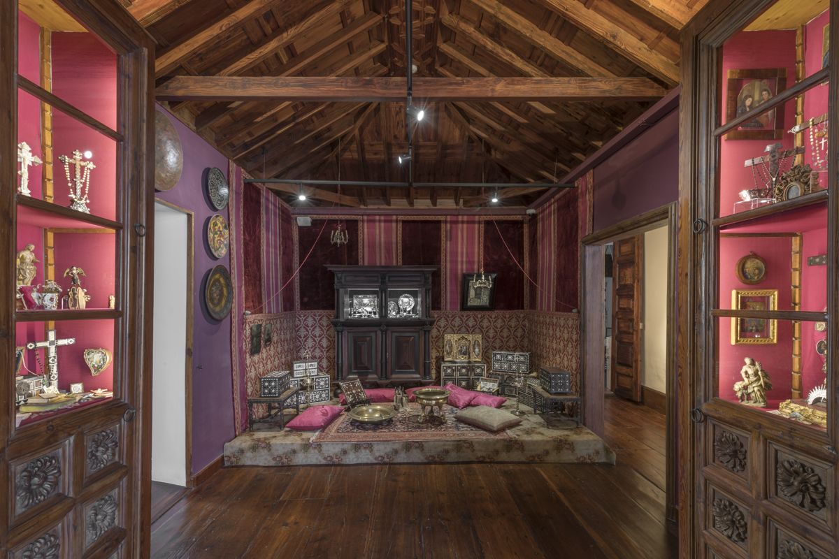 Living room with antique decoration and religious objects in the museum of Tenerife.