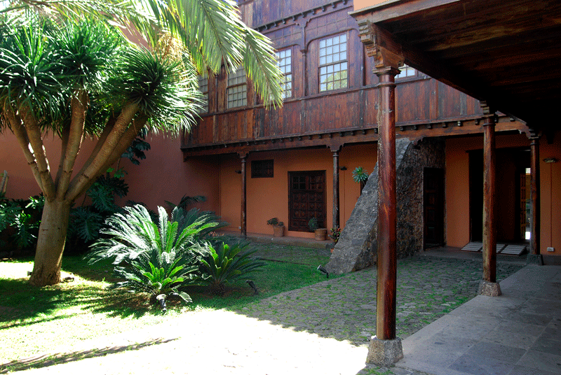 Interior courtyard with garden and wooden columns in La Orotava, Tenerife.