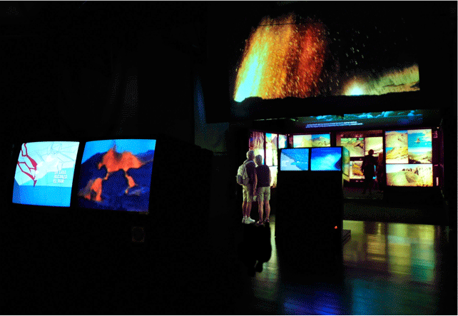Interactive exhibition at the science museum of Tenerife with illuminated screens.