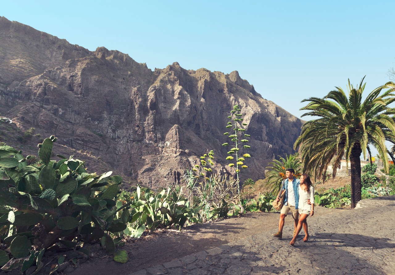 Walking along a trail in the mountainous landscape of Masca, Tenerife.