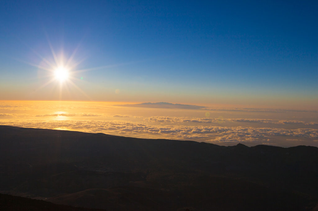 Sunset over clouds in Tenerife from Mount Teide.