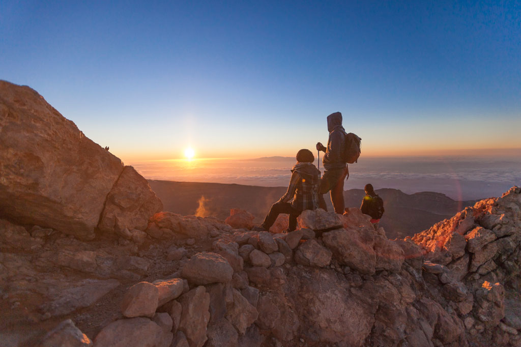 People watching the sunrise at the top of Mount Teide, Tenerife.