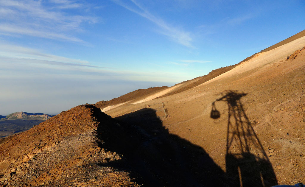Shadow of the cable car in mountainous landscape, Teide, Tenerife.