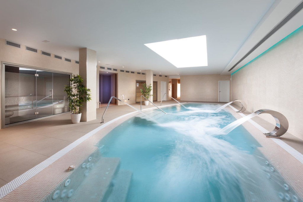 Swimming pool with jets in indoor spa in Tenerife.