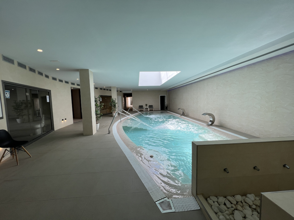 Indoor pool with waterfall in a spa in Tenerife.